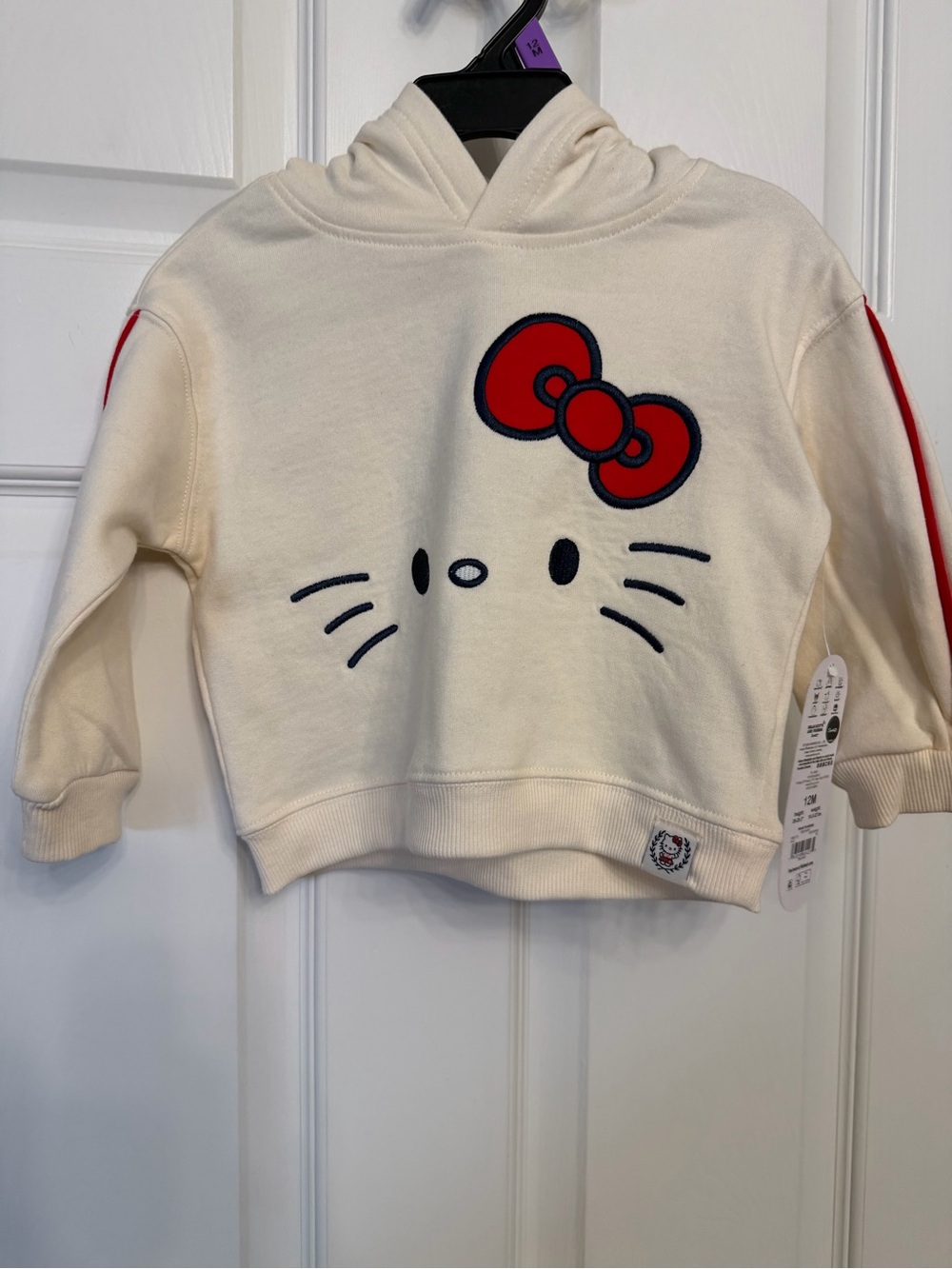 Hello Kitty Cream Pullover Hoodie with Red Bow Accent NWT